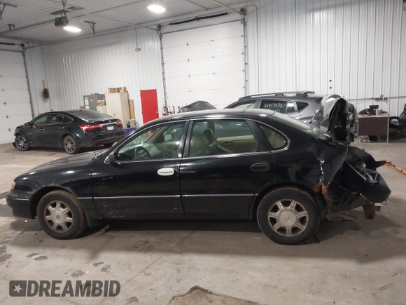 1998 Toyota Avalon XL with VIN 4T1BF18B5WU229340, listed as a IAAI auction lot 41957632 with 212,657 mi miles and . Bid and sale history available at DreamBid. Image 14.