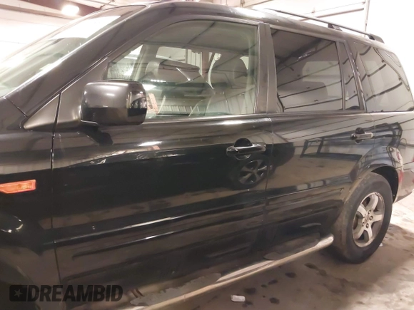 2007 Honda Pilot EX-L with VIN 5FNYF18677B017230, listed as a IAAI auction lot 41727853 with 257,527 mi miles and . Bid and sale history available at DreamBid. Image 15.