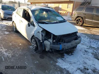 2014 Kia Rio LX with VIN KNADM4A39E6415521, listed as a IAAI auction lot 41411105 with 134,882 mi miles. Bid and sale history available at carsss.com. Image 1.