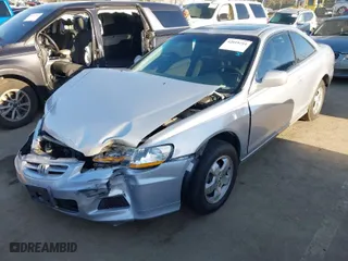 2001 Honda Accord Cpe EX with VIN 1HGCG32571A018284, listed as a IAAI auction lot 42019254 with 157,012 mi miles. Bid and sale history available at carsss.com. Image 2.