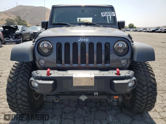 2016 Jeep Wrangler Rubicon z VIN 1C4BJWCG3GL275971, wystawiony jako Copart lot #60329125 z przebiegiem 25 956 mil mil oraz Szkoda całkowita • Salvage title. Historia ofert i sprzedaży dostępna na DreamBid. Obrazek 5.