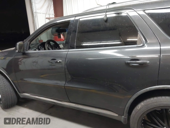 2011 Dodge Durango Crew with VIN 1D4RD4GG2BC729899, listed as a IAAI auction lot 41414720 with 209,281 mi miles and . Bid and sale history available at DreamBid. Image 14.