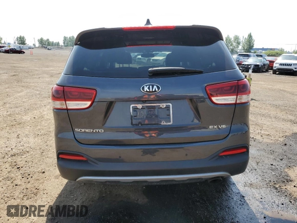 2018 Kia Sorento EX with VIN 5XYPHDA51JG354324, listed as a Copart auction lot 64730385 with 100,962 mi miles and Salvage title. Bid and sale history available at DreamBid. Image 6.