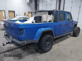 2021 Jeep Gladiator Willys with VIN 1C6HJTAG9ML535479, listed as a IAAI auction lot 41212241 with 81,044 mi miles and . Bid and sale history available at DreamBid. Image 4.