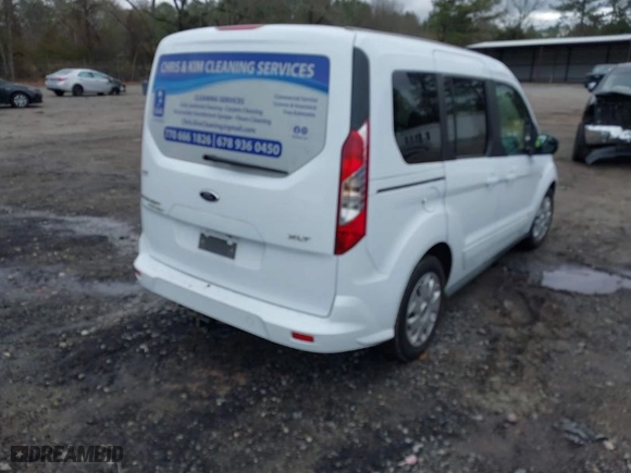 2015 Ford Transit Connect Wagon XLT with VIN NM0AE8F7XF1219105, listed as a IAAI auction lot 41237462 with 135,209 mi miles. Bid and sale history available at carsss.com. Image 4.