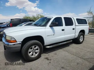 2002 Dodge Dakota SLT с VIN 1B7HG48N62S660900, выставлен на аукционе Copart как лот 59916375 с пробегом 209 325 миль миль и Списание • Salvage title. История ставок и продаж доступна на DreamBid. Изображение 1.