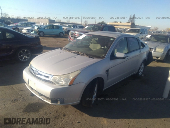 2008 Ford Focus SE with VIN 1FAHP35N78W181598, listed as a IAAI auction lot 41789881 with 95,887 mi miles and . Bid and sale history available at DreamBid. Image 2.