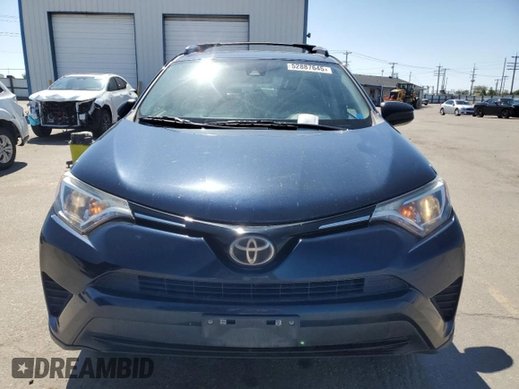 2017 Toyota RAV4 LE with VIN JTMBFREVXHJ700923, listed as a Copart auction lot 52887645 with 119,528 mi miles and Salvage title. Bid and sale history available at DreamBid. Image 5.
