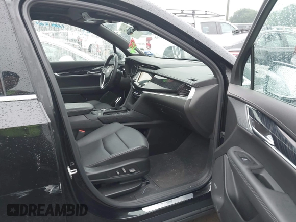 2025 Cadillac XT6 FWD Premium Luxury with VIN 1GYKPCRS3SZ120054, listed as a IAAI auction lot 42166157 with 16,280 mi miles and . Bid and sale history available at DreamBid. Image 5.