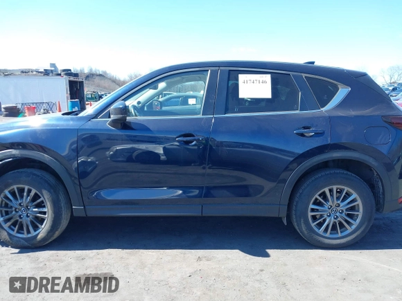 2017 Mazda CX-5 Touring with VIN JM3KFBCL8H0201074, listed as a IAAI auction lot 41747146 with 42,092 mi miles. Bid and sale history available at carsss.com. Image 14.