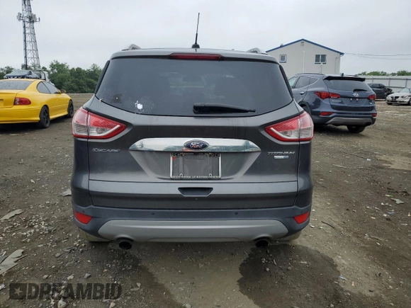 2016 Ford Escape Titanium with VIN 1FMCU9J95GUA58624, listed as a Copart auction lot 59915305 with 102,061 mi miles and Salvage title. Bid and sale history available at DreamBid. Image 6.