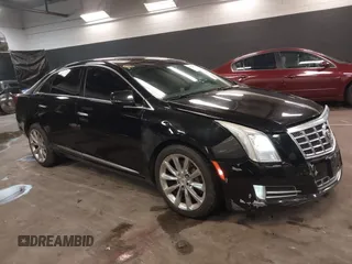 2013 Cadillac XTS Luxury with VIN 2G61R5S34D9102625, listed as a IAAI auction lot 41668752 with 112,065 mi miles. Bid and sale history available at carsss.com. Image 1.