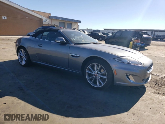 2014 Jaguar XK Touring with VIN SAJWA4EB1ELB54493, listed as a Copart auction lot 71494604 with 73,282 mi miles and Salvage Title. Bid and sale history available at carsss.com. Image 4.