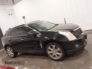2012 Cadillac SRX Performance Collection z VIN 3GYFNBE30CS628660, wystawiony jako IAAI lot #42341993 z przebiegiem 249 922 mil mil oraz . Historia ofert i sprzedaży dostępna na DreamBid. Obrazek 13.