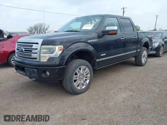 2013 Ford F-150 XL with VIN 1FTFW1ET5DFA73563, listed as a IAAI auction lot 42124436 with 239,667 mi miles. Bid and sale history available at carsss.com. Image 2.