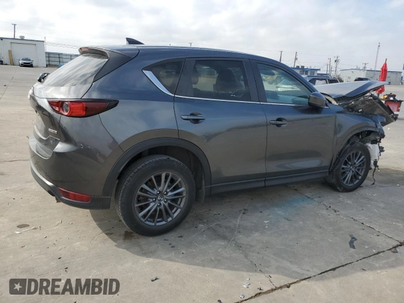 2021 Mazda CX-5 Touring with VIN JM3KFACM9M0330485, listed as a Copart auction lot 44622895 with Not Provided miles and Salvage Title. Bid and sale history available at DreamBid. Image 3.