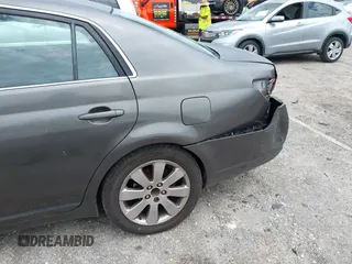 2007 Toyota Avalon XL with VIN 4T1BK36B77U213734, listed as a IAAI auction lot 41956181 with 223,857 mi miles. Bid and sale history available at carsss.com. Image 12.
