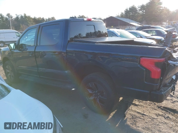 2023 Ford F-150 Lightning Pro with VIN 1FT6W1EV7PWG33511, listed as a IAAI auction lot 41761149 with 10,501 mi miles and . Bid and sale history available at DreamBid. Image 14.
