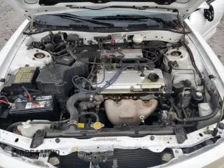 1997 Mitsubishi Galant ES z VIN 4A3AJ56G7VE098390, wystawiony jako Copart lot #84152984 z przebiegiem 177 759 mil mil oraz Czysty tytuł • Clean title. Historia ofert i sprzedaży dostępna na DreamBid. Obrazek 13.