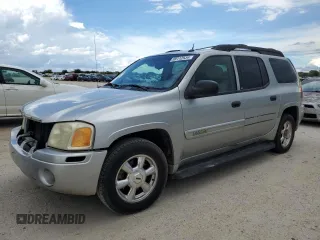 2005 GMC Envoy SLE with VIN 1GKES16S356104523, listed as a Copart auction lot 69112534 with 209,440 mi miles and Salvage Title. Bid and sale history available at DreamBid. Image 1.