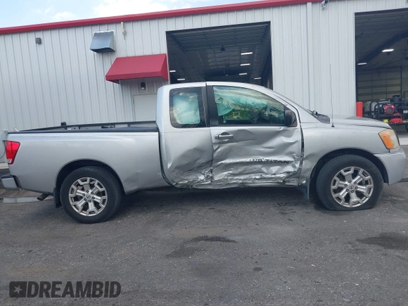 2012 Nissan Titan SE with VIN 1N6BA0CH0CN326229, listed as a IAAI auction lot 41975273 with 106,946 mi miles. Bid and sale history available at carsss.com. Image 13.