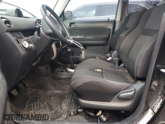 2006 Scion xB with VIN JTLKT334464042712, listed as a Copart auction lot 75289244 with 217,008 mi miles and Salvage Title. Bid and sale history available at DreamBid. Image 7.