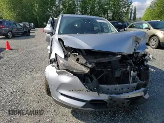 2018 Mazda CX-5 Grand Touring с VIN JM3KFBDM5J0323923, выставлен на аукционе Copart как лот 58162435 с пробегом 144 792 миль миль и Списание • Salvage title. История ставок и продаж доступна на DreamBid. Изображение 15.