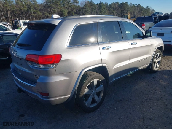 2014 Jeep Grand Cherokee Overland with VIN 1C4RJFCGXEC162238, listed as a IAAI auction lot 41291512 with 88,261 mi miles. Bid and sale history available at carsss.com. Image 4.
