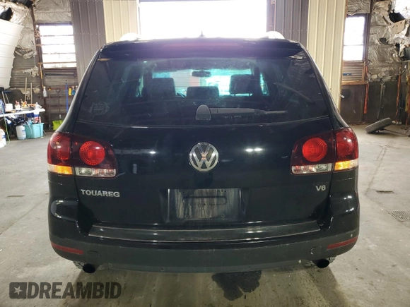 2010 Volkswagen Touareg VR6 with VIN WVGBF7A99AD002591, listed as a Copart auction lot 70624234 with 154,330 mi miles and Salvage Title. Bid and sale history available at DreamBid. Image 6.