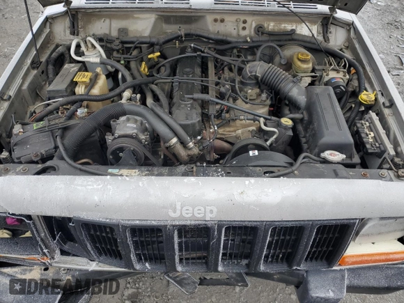 2000 Jeep Cherokee SE with VIN 1J4FF28S9YL222714, listed as a Copart auction lot 88575685 with 203,691 mi miles and Salvage Title. Bid and sale history available at carsss.com. Image 12.
