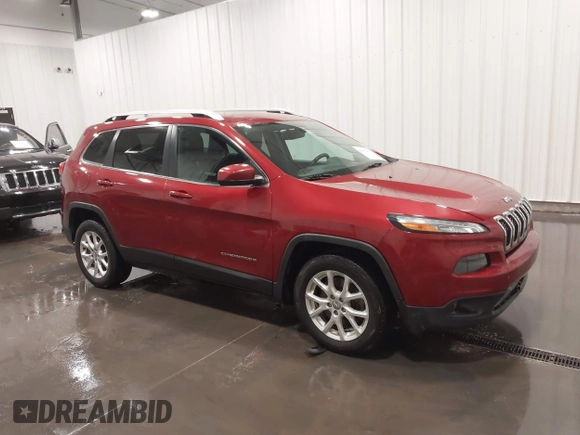 2015 Jeep Cherokee Latitude with VIN 1C4PJLCB6FW616477, listed as a IAAI auction lot 41812431 with 131,234 mi miles. Bid and sale history available at carsss.com. Image 1.