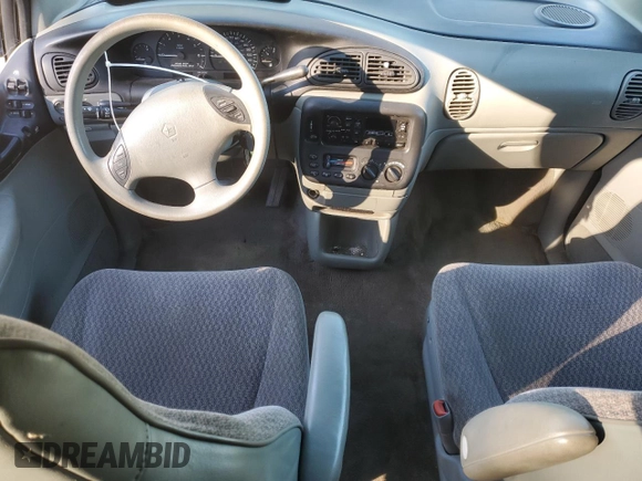 1999 Plymouth Voyager Grand SE z VIN 2P4GP44G3XR431744, wystawiony jako Copart lot #87659415 z przebiegiem Nie podano mil oraz Szkody całkowita. Historia ofert i sprzedaży dostępna na DreamBid. Obrazek 8.