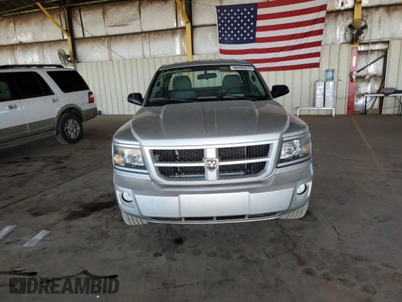 2011 Dodge Dakota with VIN 1D7RE3BP8BS510730, listed as a Copart auction lot 60486815 with 66,539 mi miles and Salvage title. Bid and sale history available at DreamBid. Image 5.