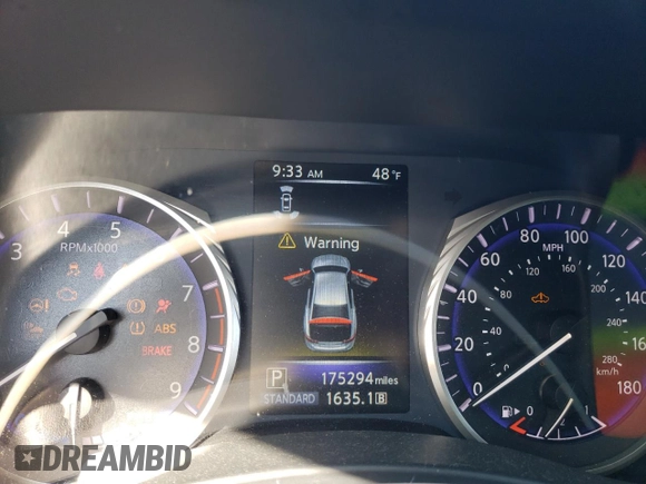 2014 Infiniti Q50 Hybrid Premium z VIN JN1AV7AP4EM691207, wystawiony jako Copart lot #52329415 z przebiegiem 175 294 mil mil oraz Szkody całkowita. Historia ofert i sprzedaży dostępna na DreamBid. Obrazek 9.