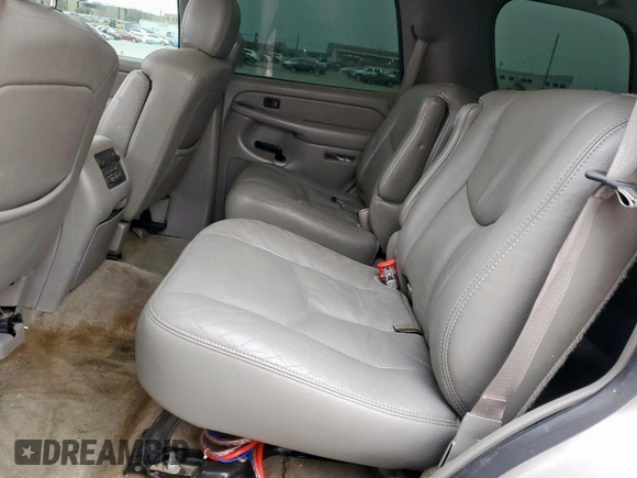 2004 Chevrolet Tahoe LS z VIN 1GNEC13Z14R249851, wystawiony jako Copart lot #48236485 z przebiegiem 185 088 mil mil oraz Szkoda całkowita • Salvage title. Historia ofert i sprzedaży dostępna na DreamBid. Obrazek 11.