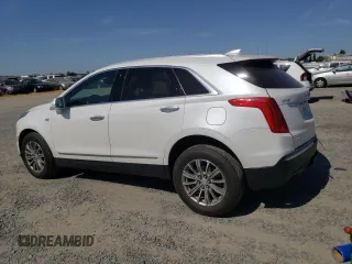 2017 Cadillac XT5 Luxury AWD with VIN 1GYKNDRS0HZ180703, listed as a Copart auction lot 58793895 with 30,339 mi miles and Salvage title. Bid and sale history available at DreamBid. Image 2.