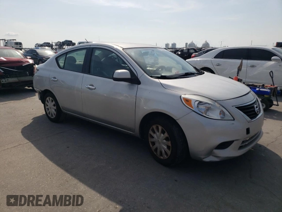 2012 Nissan Versa SV with VIN 3N1CN7AP7CL825501, listed as a Copart auction lot 63093735 with 129,227 mi miles and Salvage title. Bid and sale history available at DreamBid. Image 4.