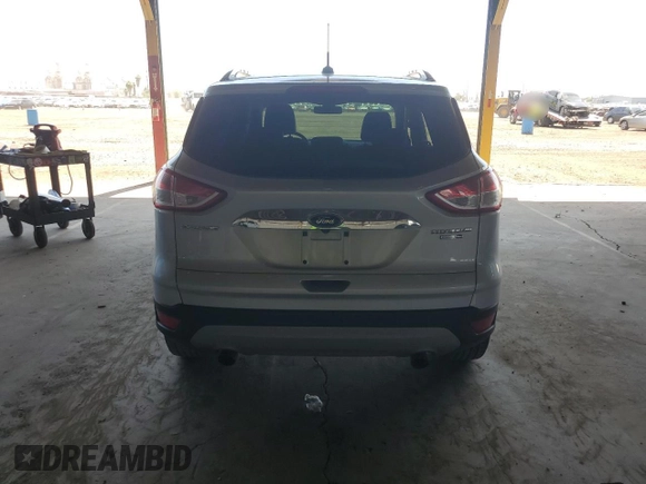 2015 Ford Escape Titanium with VIN 1FMCU9J96FUB33670, listed as a Copart auction lot 61826915 with 179,794 mi miles and Salvage title. Bid and sale history available at DreamBid. Image 6.