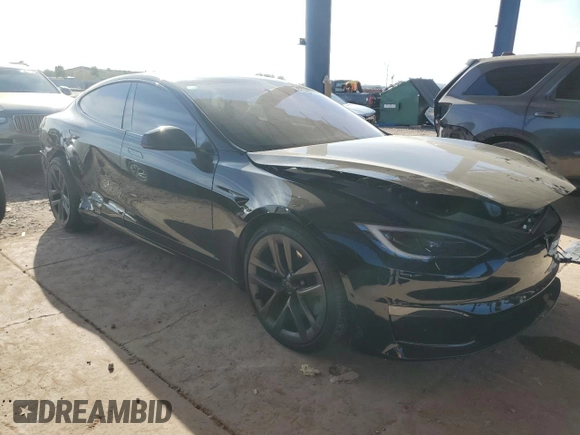 2022 Tesla Model S z VIN 5YJSA1E51NF474743, wystawiony jako Copart lot #87316374 z przebiegiem Nie podano mil oraz Szkoda całkowita • Salvage title. Historia ofert i sprzedaży dostępna na DreamBid. Obrazek 4.