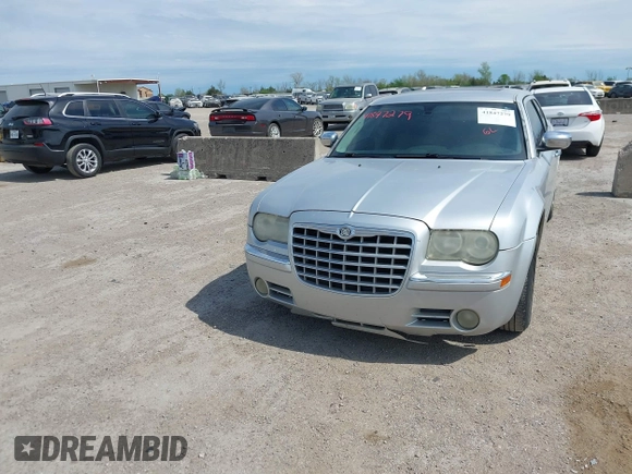 2005 Chrysler 300 with VIN 2C3JA63H05H693522, listed as a IAAI auction lot 41847279 with 162,037 mi miles. Bid and sale history available at carsss.com. Image 6.