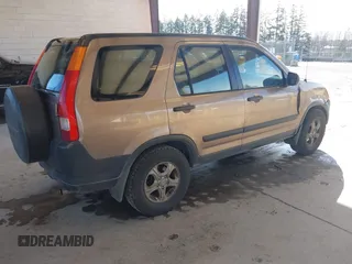 2002 Honda CR-V LX z VIN JHLRD78512C007757, wystawiony jako IAAI lot #41885302 z przebiegiem 177 892 mil mil oraz . Historia ofert i sprzedaży dostępna na DreamBid. Obrazek 4.