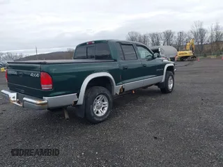 2001 Dodge Dakota Sport with VIN 1B7HG2AN91S279538, listed as a IAAI auction lot 41925891 with 113,368 mi miles and . Bid and sale history available at DreamBid. Image 4.