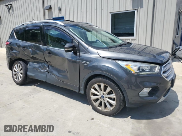 2018 Ford Escape Titanium with VIN 1FMCU0J93JUB20136, listed as a Copart auction lot 56841065 with 129,954 mi miles and Salvage title. Bid and sale history available at DreamBid. Image 4.
