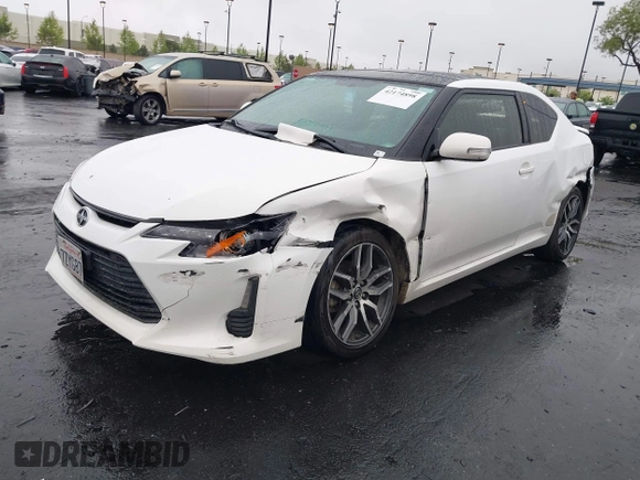 2014 Scion tC z VIN JTKJF5C77E3080128, wystawiony jako IAAI lot #42174898 z przebiegiem Nie podano mil oraz . Historia ofert i sprzedaży dostępna na DreamBid. Obrazek 17.
