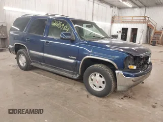 2002 GMC Yukon SLT z VIN 1GKEK13Z32J169320, wystawiony jako IAAI lot #42025984 z przebiegiem 93 733 mil mil oraz . Historia ofert i sprzedaży dostępna na DreamBid. Obrazek 1.