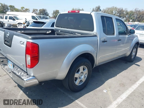2008 Nissan Frontier SE with VIN 1N6AD07U98C446026, listed as a IAAI auction lot 42674312 with 228,909 mi miles and . Bid and sale history available at DreamBid. Image 4.