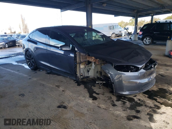 2023 Tesla Model X with VIN 7SAXCDE55PF410146, listed as a Copart auction lot 48818085 with 26,494 mi miles and Salvage Title. Bid and sale history available at DreamBid. Image 4.