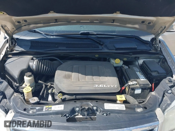 2013 Chrysler Town & Country Touring L with VIN 2C4RC1CG2DR767406, listed as a IAAI auction lot 42067814 with 75,985 mi miles and . Bid and sale history available at DreamBid. Image 10.