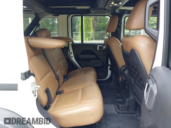2021 Jeep Wrangler Unlimited Rubicon with VIN 1C4JJXFM9MW774142, listed as a IAAI auction lot 42625007 with 42,318 mi miles and . Bid and sale history available at DreamBid. Image 8.