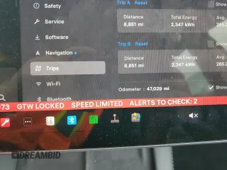 2023 Tesla Model 3 with VIN 5YJ3E1EA7PF450973, listed as a Copart auction lot 61082175 with 47,029 mi miles and Salvage title. Bid and sale history available at DreamBid. Image 9.
